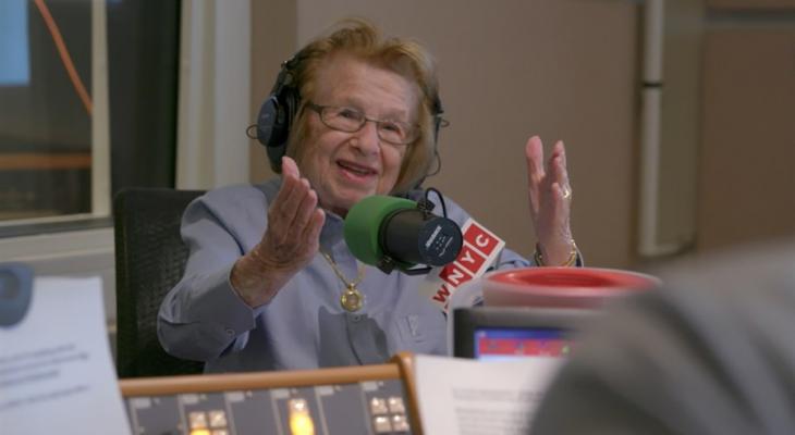 Dr. Ruth speaking into a microphone