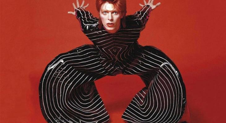 David Bowie in a striped pant suit