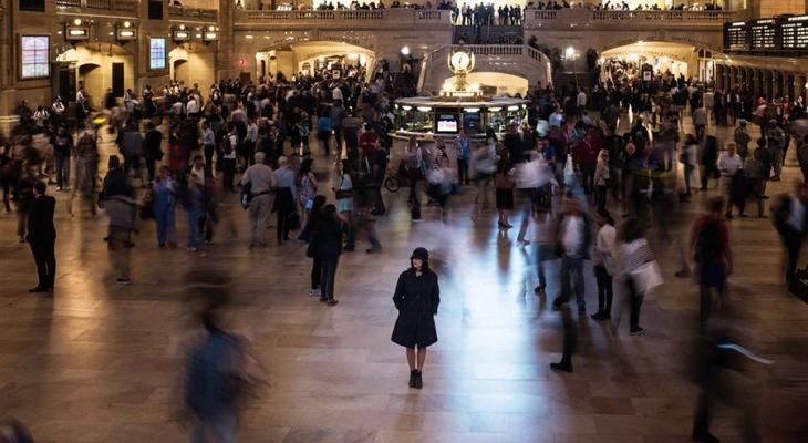 Person walking through a crowd