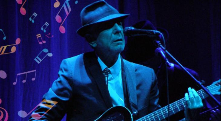 musician Leonard Cohen singing and playing guitar