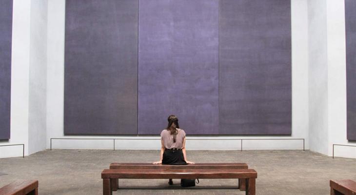 Woman staring at a painting