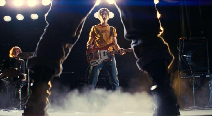 Scott stares down Ramona's evil ex, Matthew Patel, on stage at a concert. 