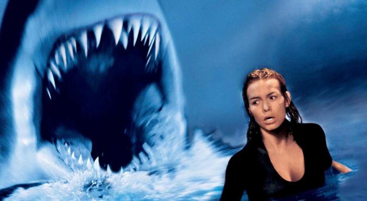 A mutant shark threatens a medical researcher.