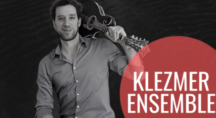 a photo of the leader of the program alongside the words "klezmer ensemble" written in a red circle beside him