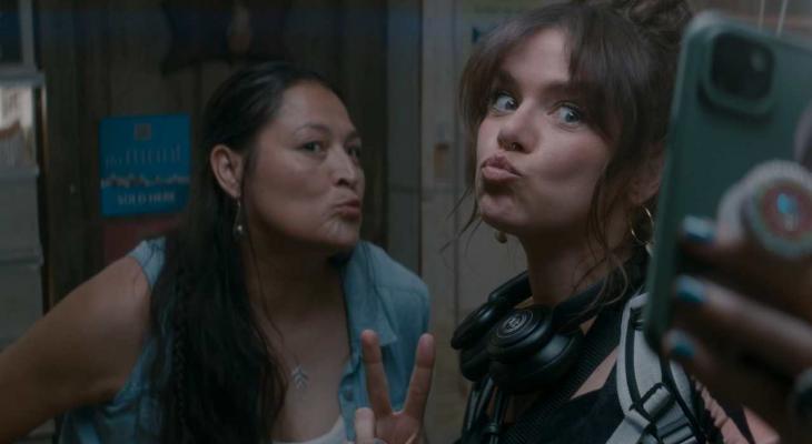 Two women take a selfie.