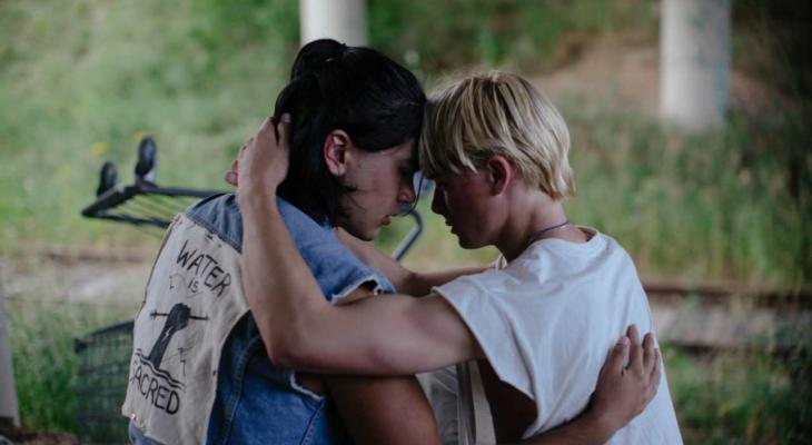 Two teens share an intimate moment.