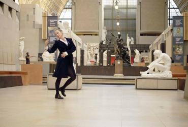 Person walking through a museum