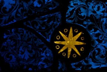 A yellow star on a blue background