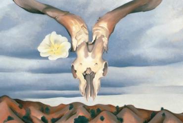 a painting of an animal skull with antlers and a flower