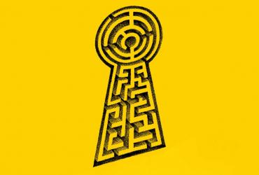 a keyhole with a hedge maze inside