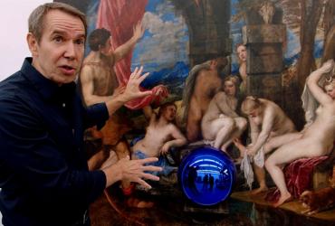 Man talking about a painting in a gallery