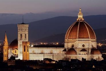 Exterior of Cathedral of Santa Maria del Fiore at dusk. 