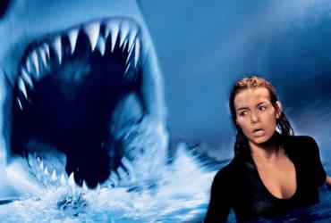 A mutant shark threatens a medical researcher.