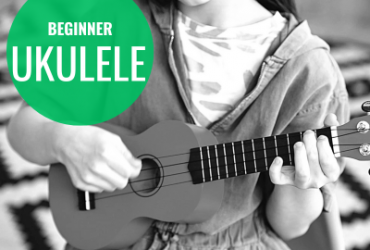 a photo of someone playing ukelele with the words "beginner ukelele" written in a green circle beside them